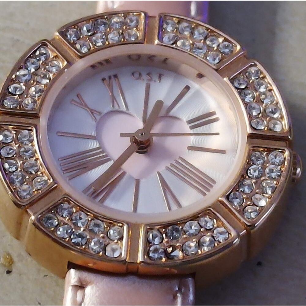 Elegant rose gold O.S.T. watch with a heart cutout dial matching band romanticfn